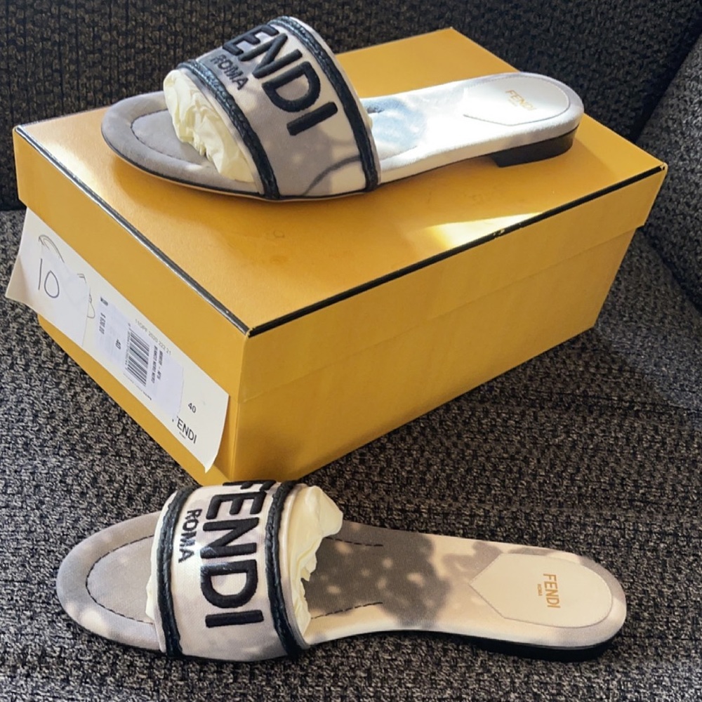 FENDI slides.  Only worn 2-3 times.  Runs small.
